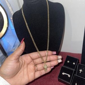 14k gold hollow Cuban chain with divine pendant length 20” width 4.2mm